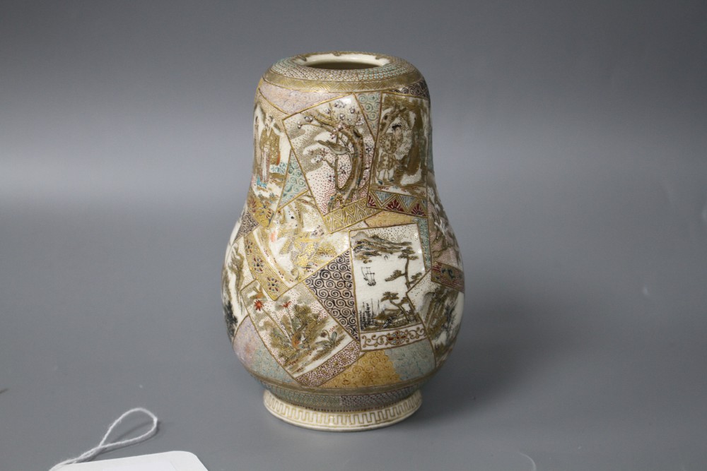 A Satsuma gourd shaped vase, decorated with panels of figures, flowers and landscapes, height 12cm